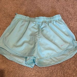 Never worn, teal athletic shorts with drawstrings, size medium,dri-fit
